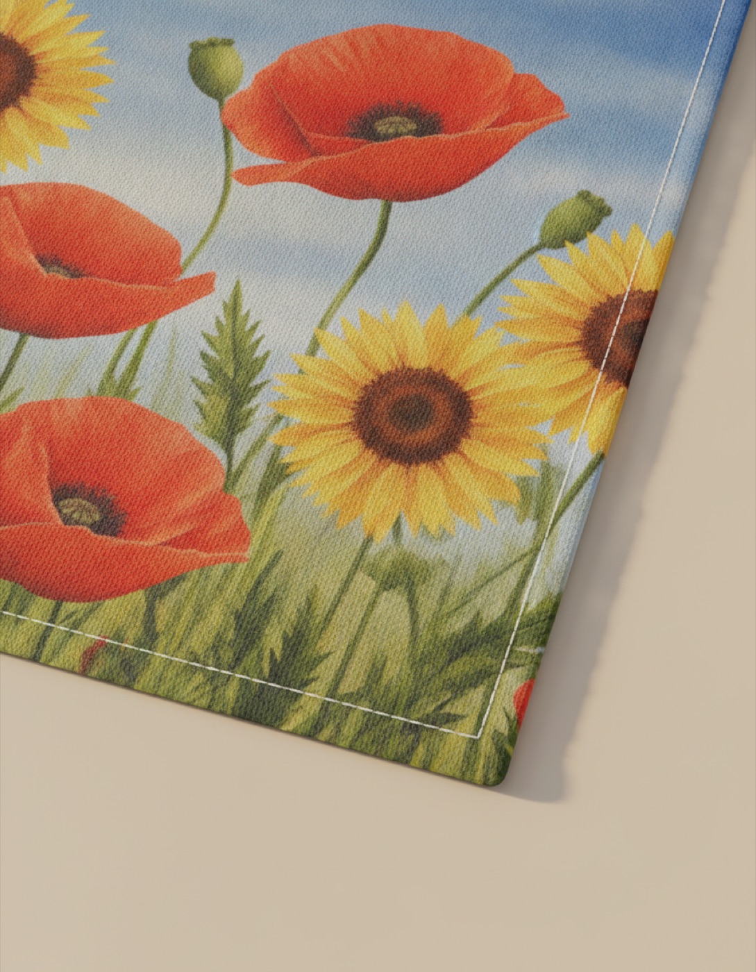 Close-up of the printed polyester weave and the stitched hem of a garden flag